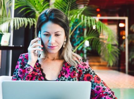 woman talking on phone in virtual therapy session